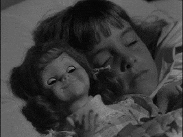 black and white doll GIF
