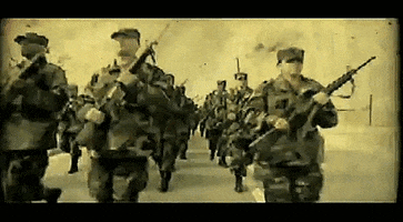 marching iraq war GIF