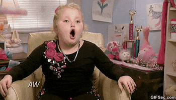 Reality TV gif. A young Alana "Honey Boo Boo" Thompson from Here Comes Honey Boo Boo rolls her eyes back and forth as she says "Awesome!"