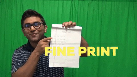Man on a green screen holding up a contract while the words FINE PRINT appear on screen
