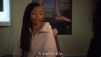 TV gif. Halle Bailey, as Sky in Grown-ish, shrugs her shoulders in acceptance and says, “It is what it is.”