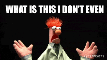 Muppets gif. Beaker with his red hair and large mouth raises his hands in the air and shakes violently in horror.