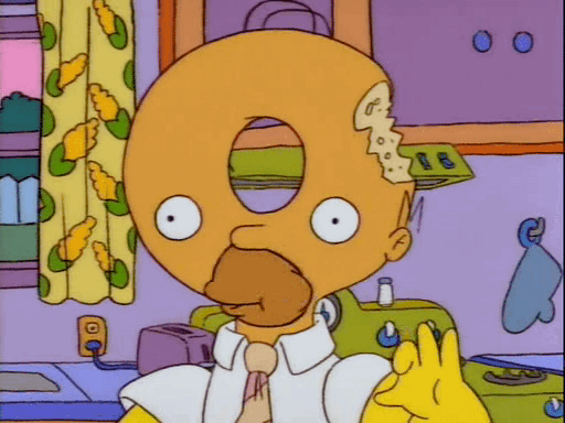 Gif Image Most Wanted Homer Simpson Eating A Donut Gif