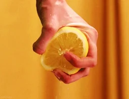 lemon squeezing GIF
