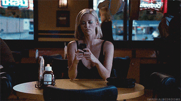 young adult texting GIF