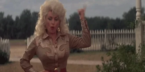 dolly parton pointing GIF