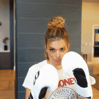 Boxing Punch GIF by Jasmine Star