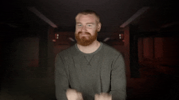 TV gif. Wes Bergmann from MTV's The Challenge, leans forward with two thumbs up and pointed fingers.