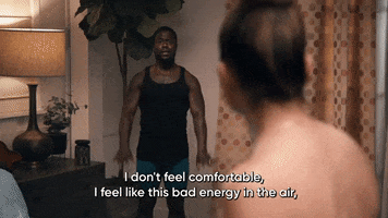 TV gif. Kevin Hart on Real Husbands of Hollywood looks at a woman and swings his arms at his sides nervously as he says, “I don’t feel comfortable, I feel like this bad energy in the air, and I don’t like it.”