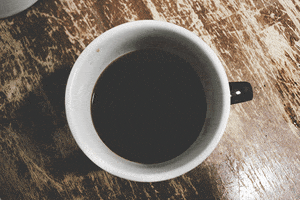 deathwishcoffee coffee surprise skull coffee cup GIF