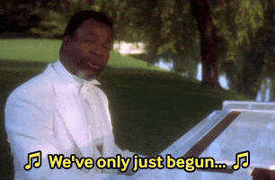 Movie gif. Carl Weathers as Chubbs Peterson in Happy Gilmore sits outside in all white tux at a gleaming white grand piano and sings, "We've only just begun," which appears as text.