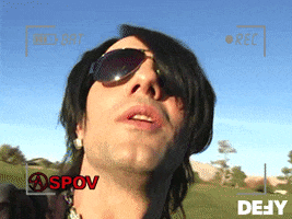 TV gif. Criss Angel appears to hold the camera, opens his mouth wide, and the screen goes dark.