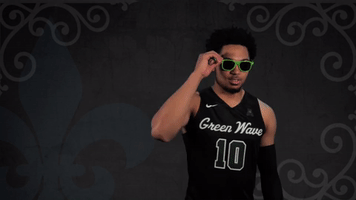 mens basketball wink GIF by GreenWave