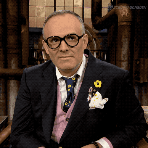 TV gif. A confused Vincenzo Guzzo on Dragons' Den asks, “Uh, who?”