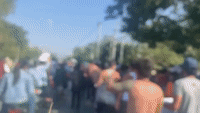 Shirtless Men March in Mandalay Against Military Takeover