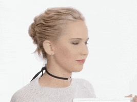 Celebrity gif. Jennifer Lawrence looks straight at us and slowly but surely shakes her head, saying no.