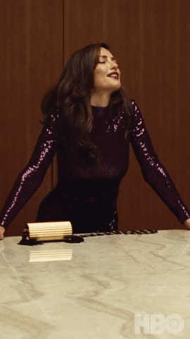 TV gif. Minka Kelly as Samantha in Euphoria propping herself up against a counter, wearing a sparkly purple dress, says "It's nice to be drunk."
