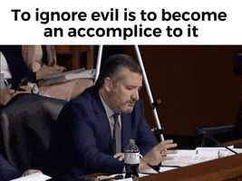 Meme gif. Senator Ted Cruz sits at a table during a confirmation hearing. As he turns his head, cartoon devil horns appear on his head. The image goes black and white and his eyes turn to blazing red orbs. Text, "To ignore evil is to become an accomplice to it." Then, an image of Dos Equis' most interesting man in the world appears, with the text, "Choose wisely, my friends."
