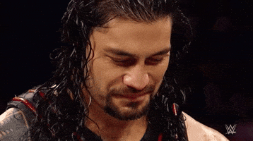 roman reigns wrestling GIF by WWE