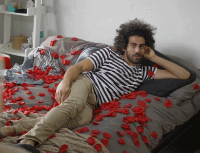 Image result for rose petals on bed gif