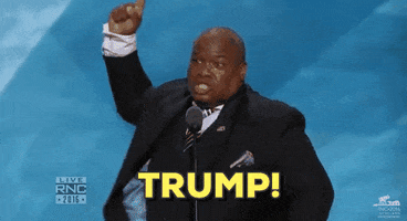Political gif. Mark Burns on stage at the 2016 Republican National Convention, pointing up and shouting "Trump!"