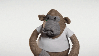 Video gif. The PG Tips monkey puppet looks at us crying and wipes a tear, visibly upset.