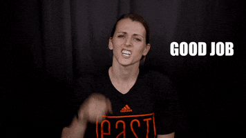 Sports gif. Allie Quigley points her finger at us, proud, and says "good job," which appears as text.
