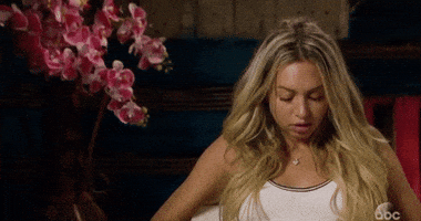 Reality TV gif. Corinne from the Bachelor sits in a confessional. She rolls her eyes and throws her head back dramatically, exasperated or tired of the drama. Can't blame her, really.