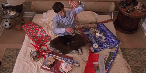 the oc wrapping presents GIF