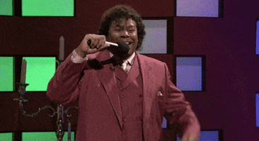 SNL gif. Kenan Thompson, as talk show host Diondre, pumps his fist in victory and says, “Oh yea!”