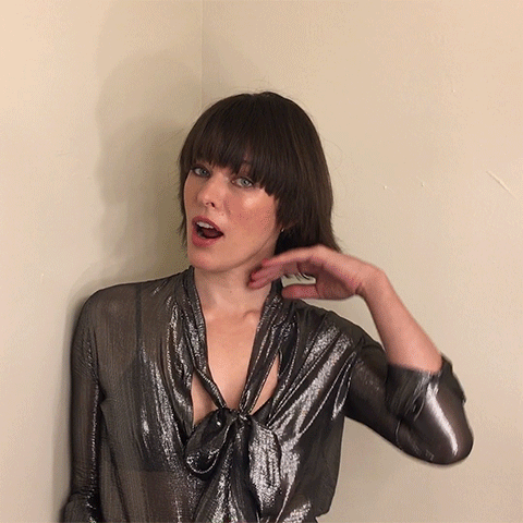 Milla Jovovich Hair Flip Gif By Resident Evil Irl GIF - Find & Share on
