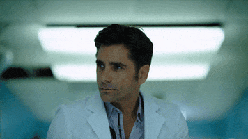 john stamos sexy smile GIF by ScreamQueens