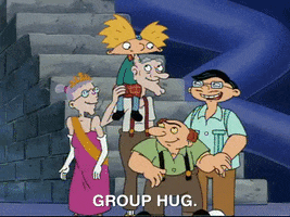Cartoon gif. At the bottom of a tall brick staircase, Arnold from Hey Arnold! sits on his grandfather's shoulders. Standing next to them are Arnold's grandmother, who wears a pink dress, a crown, and a sash, as well as Mr. Hyunh and Ernie. The five of them gather together for a, Text, "Group hug."