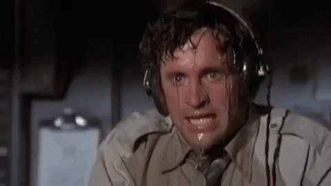 hot nervous sweaty sweating airplane movie GIF