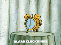 smashing alarm clock gif
