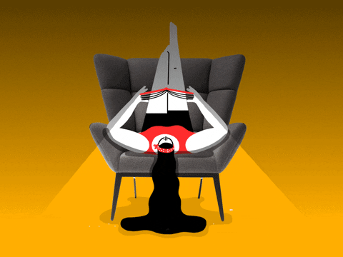 Animated gif of a woman with long black hair lying upside down on a chair reading an illuminated book.