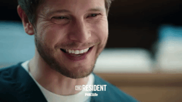 the resident laughing GIF