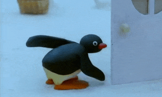 penguin spank GIF