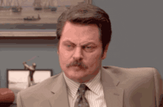  nbc parks and recreation frustrated sigh ron swanson GIF