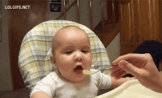 Video gif. Baby's face contorts the very moment baby food enters his mouth. He grimaces in utter disgust, almost as if he's betrayed by being fed with something like that.