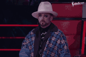 Reality TV gif. Boy George as a judge on The Voice Australia looks at a contestant with respect and pride, saying, "that's how you do a performance, babe."
