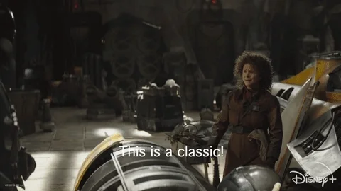 Peli Motto says "This is a classic!" as she pounds her fist on an engine and a part falls off