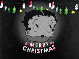 Cartoon gif. Black-and-white Betty Boop winks at us from the center of a dusty charcoal colored background. Garland with trees, snowmen, stockings, and stars sways above her head; red and green flickering text below her reads "Merry Christmas."