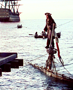Jack Sparrow arrives to Port Royal on the sinking Jolly Mon. Gif from "Pirates of the Caribbean: The Curse of the Black Pearl"