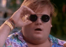 SNL gif. Chris Farley in the Schmitts Gay Beer sketch lifts the sunglass portion of his double lenses in stunned surprise.