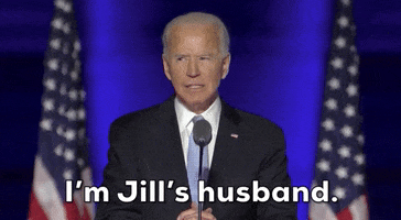 Political gif. Joe Biden stands at a podium and speaks into a mic. He has a serious expression on his face as he says, “I’m Jill’s Husband.”