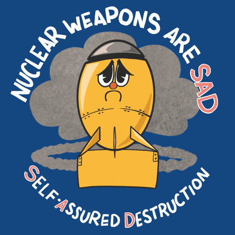 Digital art gif. Cartoon of an orange nuclear warhead with a frowning, sad face, the eyes welling up with tears. Text above the warhead reads, "Nuclear weapons are S-A-D," with S-A-D in red letters. Underneath the warhead, text reads, "Self-assured destruction," with the S, A, and D in red. Everything is against a blue background.