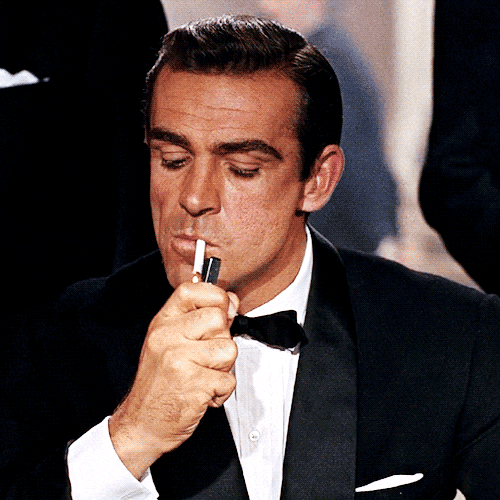 James Bond Cigarette GIF - Find & Share on GIPHY