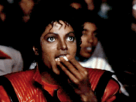  michael jackson comments popcorn eating popcorn entertained GIF