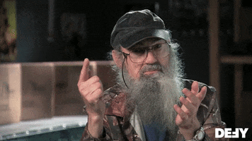 TV gif. Phil Robertson on Duck Dynasty holds his hands out to help explain what he’s saying. He draws a checkpoint in the air with his finger and says, “Check”